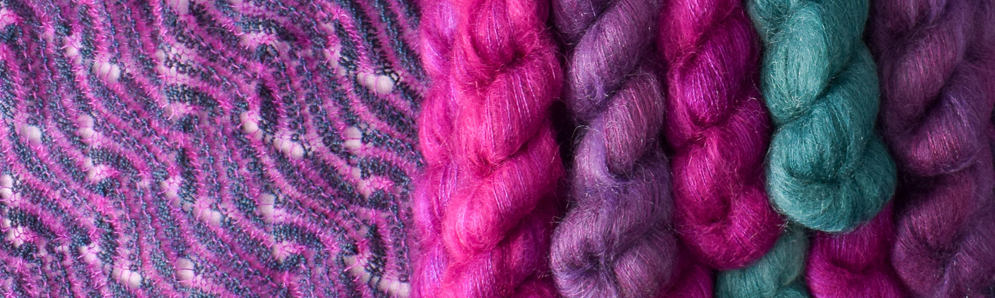 Fuzzy mohair Moonglow yarn in purple and green on a knitted shawl