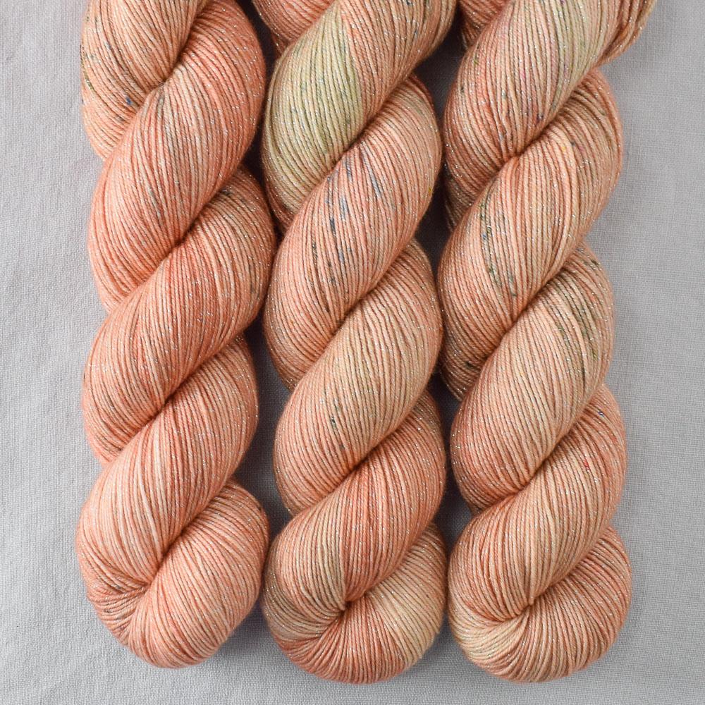 Rosy Finch - Miss Babs Estrellita fingering weight superwash merino and Lurex yarn