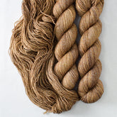 A Step Above - Miss Babs Estrellita fingering weight superwash merino and Lurex yarn