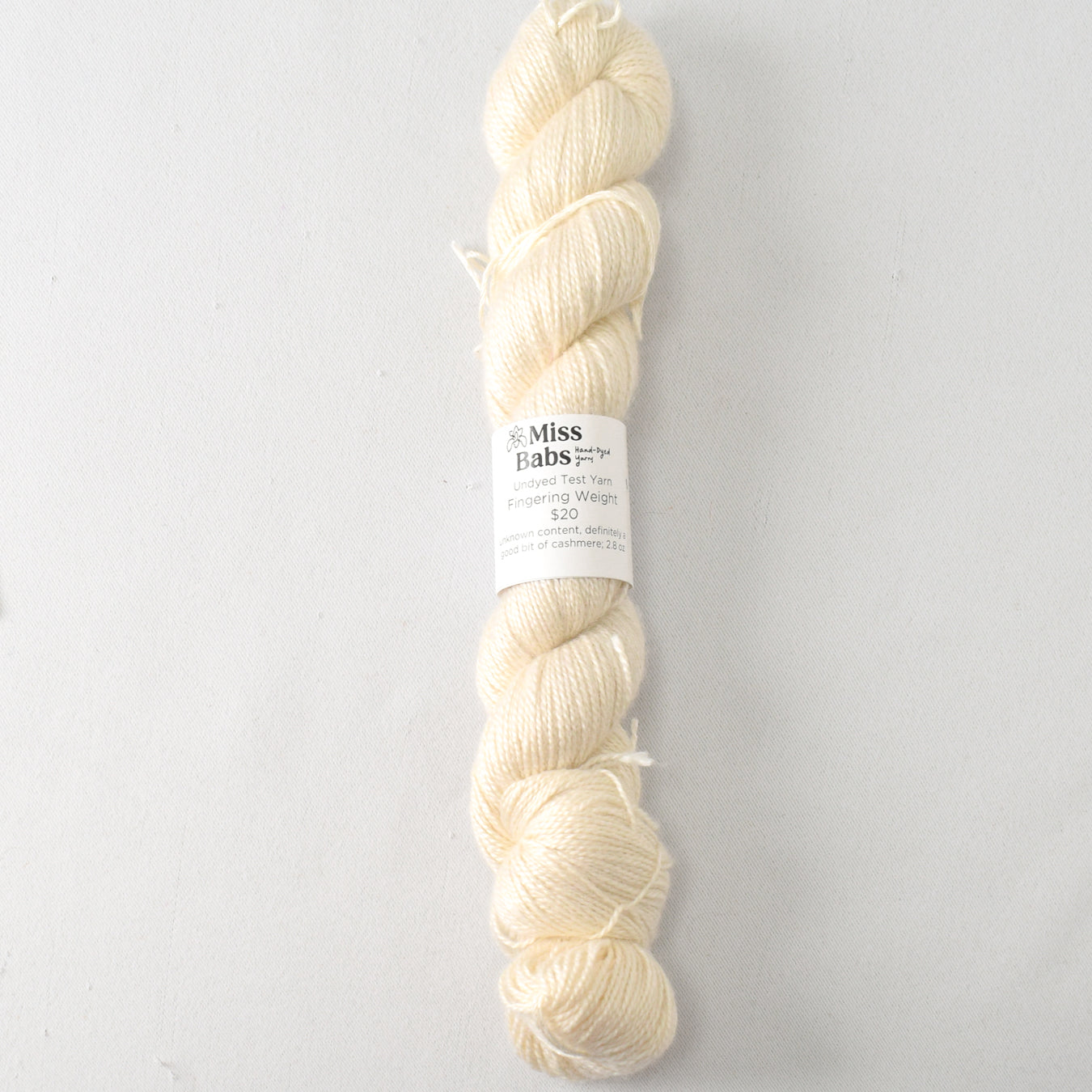 Fingering Weigh, Unknown content, definitely a good bit of cashmere. 2.8 oz. - Miss Babs Undyed Test Yarn
