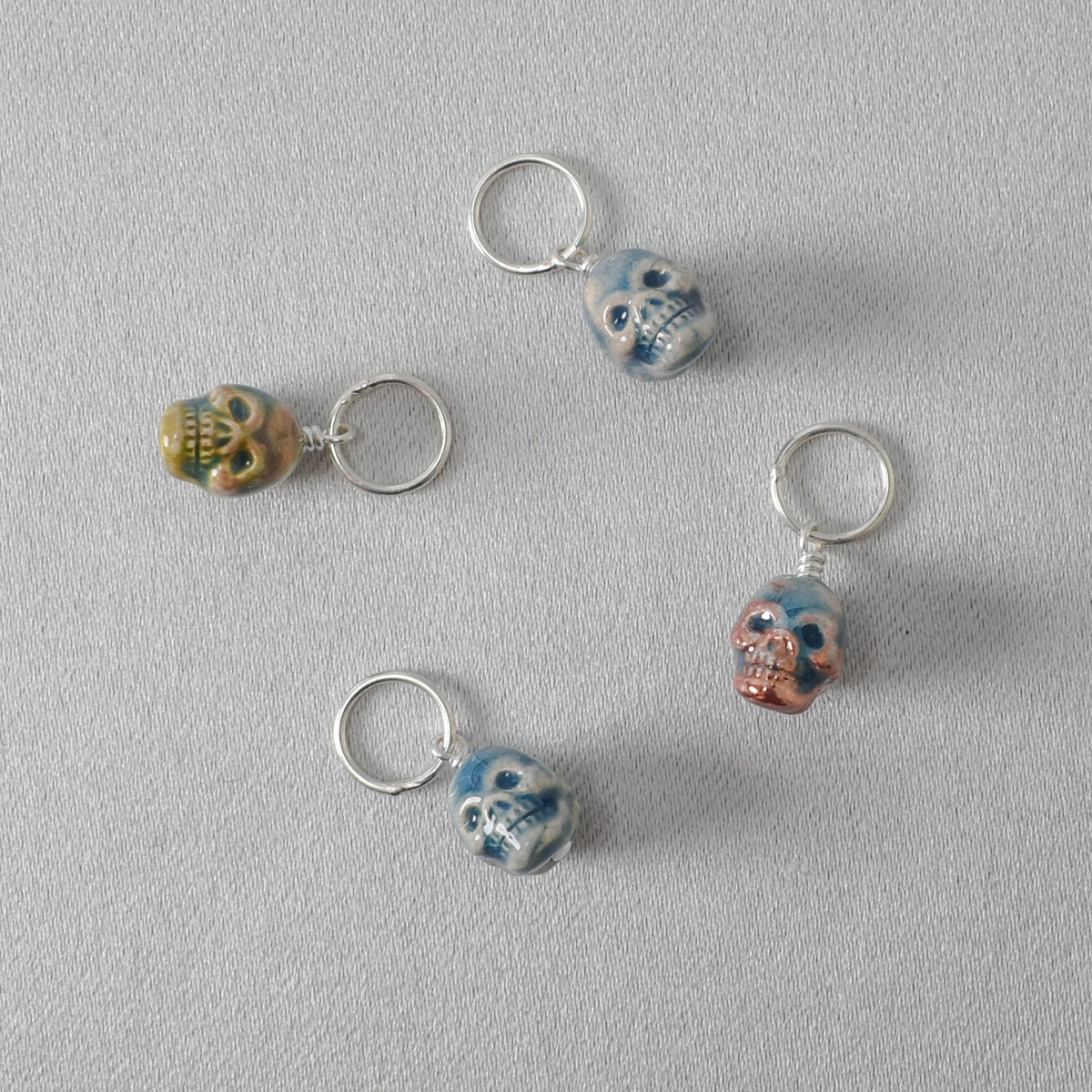 Raku Skulls Stitch Markers