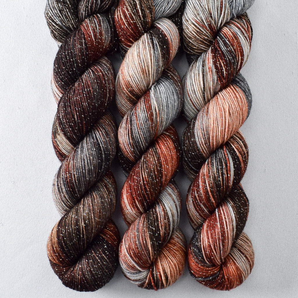 Wolves Den - Miss Babs Estrellita fingering weight superwash merino and Lurex yarn