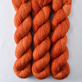 Carnelian - Miss Babs Estrellita fingering weight superwash merino and Lurex yarn