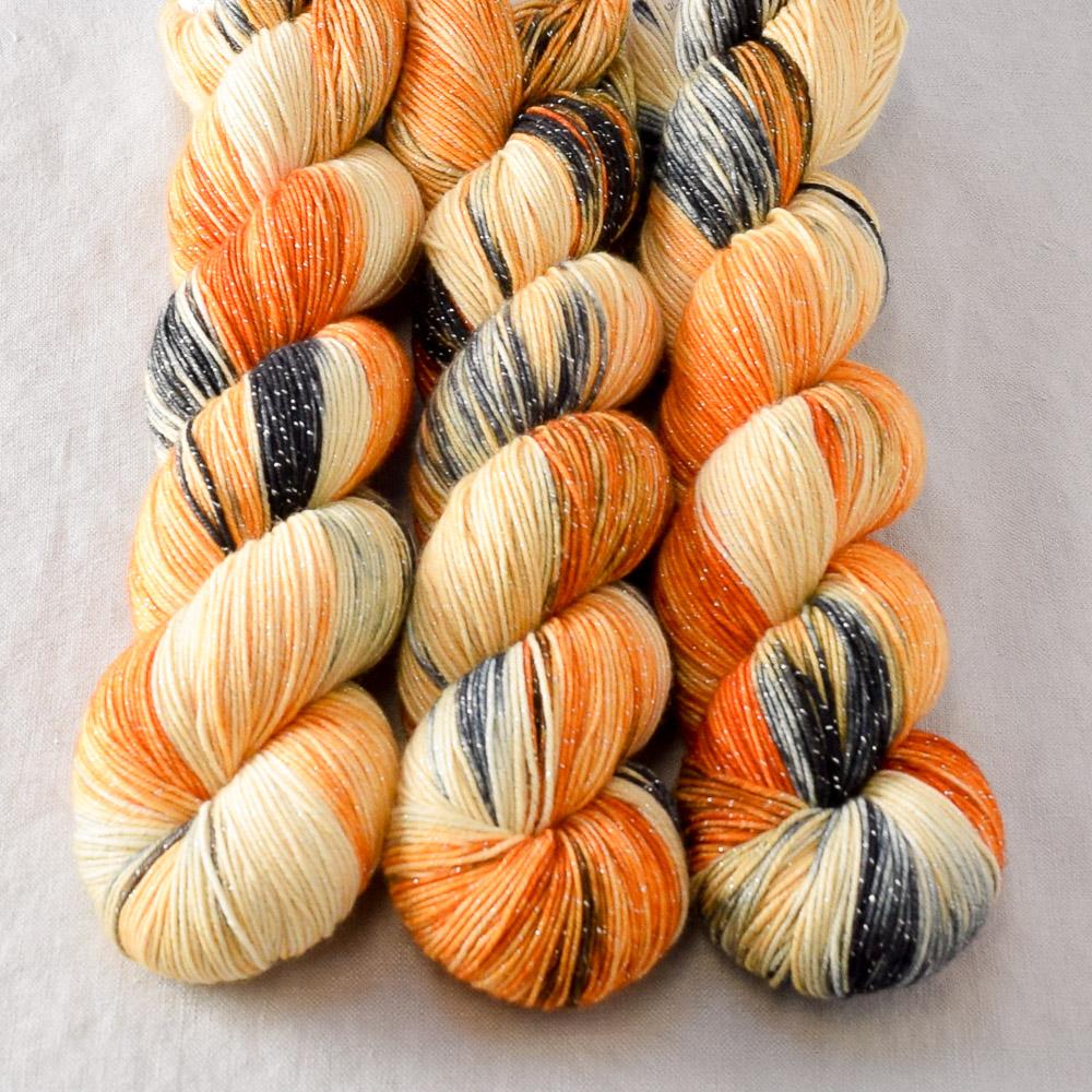 Clownfish - Miss Babs Estrellita fingering weight superwash merino and Lurex yarn