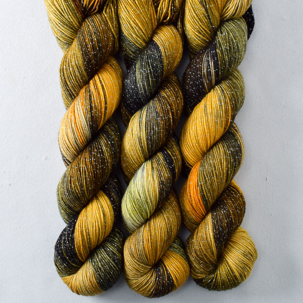 Fiery Cauldron - Miss Babs Estrellita fingering weight superwash merino and Lurex yarn