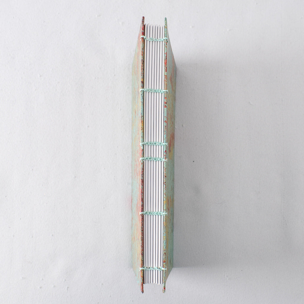Large Handmade Journal with Teal, Red, and Yellow Print Cover